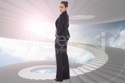 Composite image of serious businesswoman