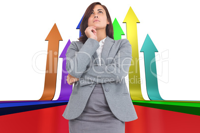 Composite image of focused businesswoman