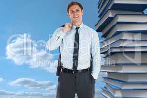 Composite image of smiling businessman holding his jacket