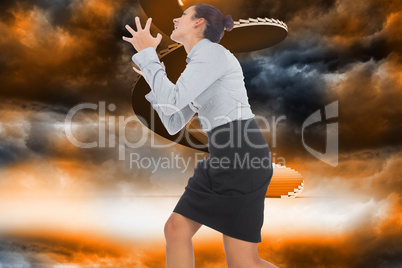 Composite image of furious businesswoman gesturing