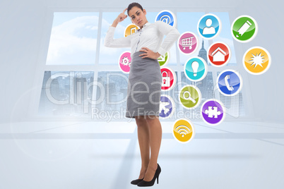 Composite image of focused businesswoman