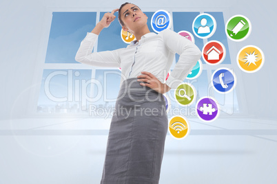 Composite image of worried businesswoman