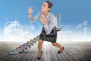 Composite image of furious businesswoman gesturing