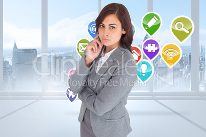 Composite image of focused businesswoman