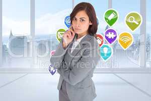 Composite image of focused businesswoman