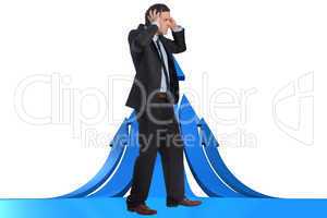 Composite image of stressed businessman with hands on head