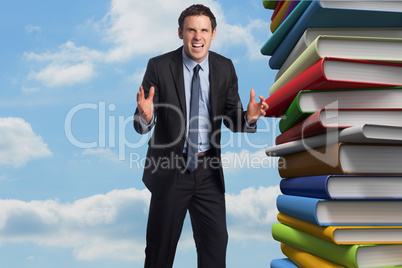 Composite image of stressed businessman gesturing