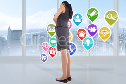 Composite image of thinking asian businesswoman