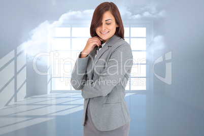 Composite image of thoughtful businesswoman