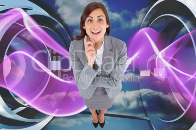 Composite image of smiling thoughtful businesswoman