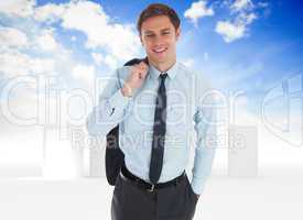 Composite image of smiling businessman holding his jacket