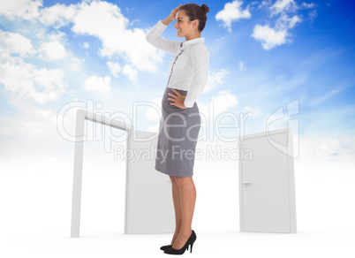 Composite image of smiling thoughtful businesswoman