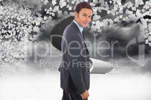 Composite image of cheerful handsome businessman standing