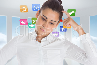 Composite image of focused businesswoman