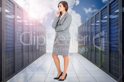 Composite image of worried businesswoman