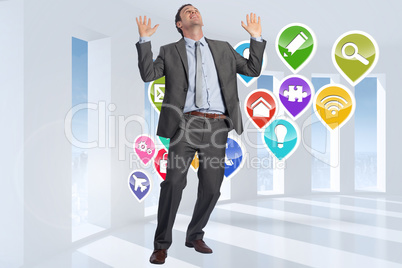 Composite image of businessman posing with arms raised