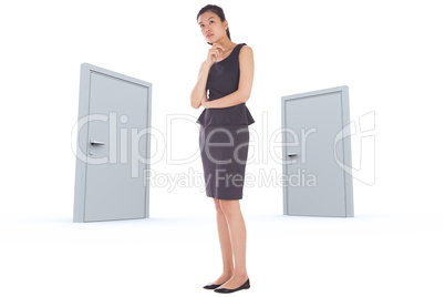 Composite image of thoughtful businesswoman