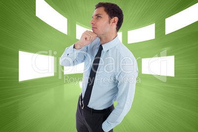 Composite image of thoughtful businessman with hand on chin