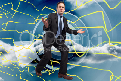 Composite image of businessman posing with arms outstretched