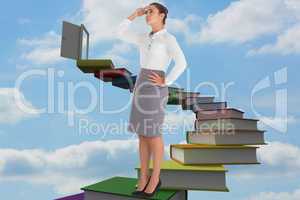 Composite image of focused businesswoman