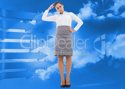 Composite image of focused businesswoman