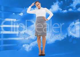 Composite image of focused businesswoman