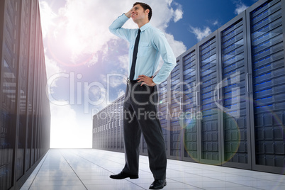 Composite image of thoughtful businessman with hand on head