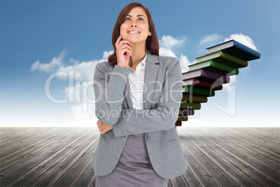 Composite image of thinking happy businesswoman