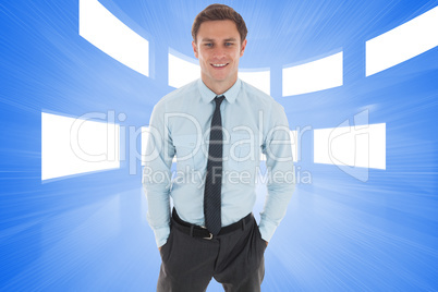 Composite image of happy businessman standing with hands in pock