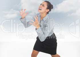 Composite image of furious businesswoman gesturing