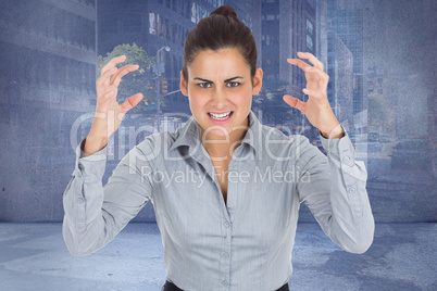 Composite image of furious businesswoman gesturing