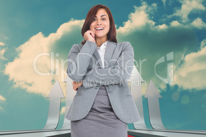 Composite image of smiling thoughtful businesswoman