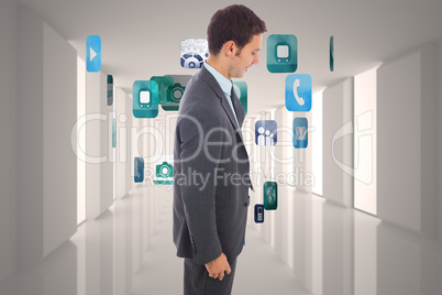 Composite image of cheerful handsome businessman standing