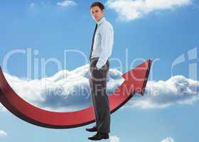 Composite image of serious businessman standing with hands in po