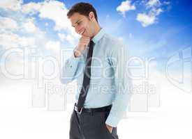 Composite image of thoughtful businessman with hand on chin