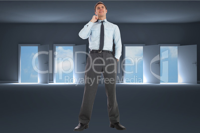 Composite image of smiling businessman holding his jacket