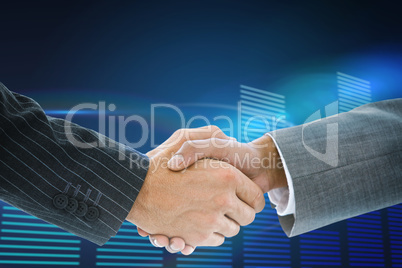 Composite image of business handshake