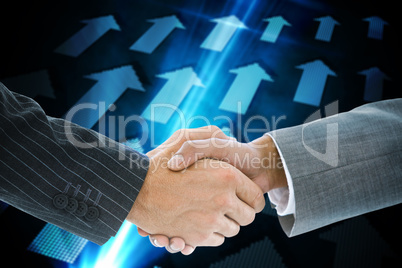 Composite image of business handshake