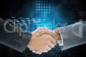 Composite image of business handshake