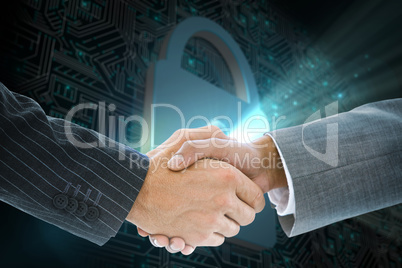 Composite image of business handshake