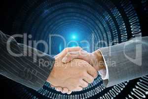 Composite image of business handshake