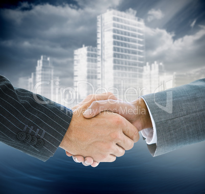 Composite image of business handshake Composite image of business handshake