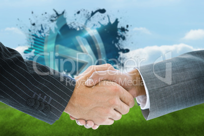 Composite image of business handshake