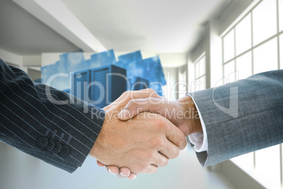 Composite image of business handshake