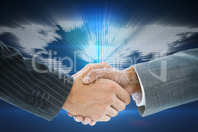 Composite image of business handshake