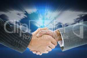 Composite image of business handshake