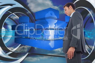 Composite image of stern businessman standing