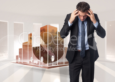 Composite image of stressed businessman with hands on head