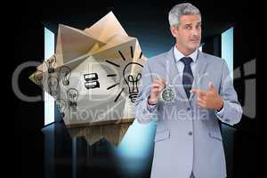 Composite image of businessman holding alarm clock