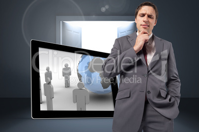 Composite image of thoughtful businessman with hand on chin